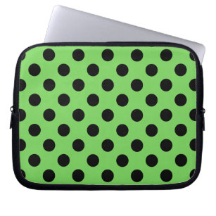 Black polka dots on lime green laptop sleeve