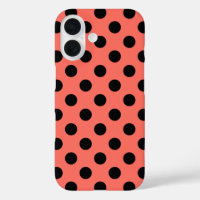 Black polka dots on living coral