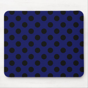 Black polka dots on navy blue mouse pad