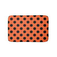 Black polka dots on orange