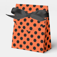 Black polka dots on orange