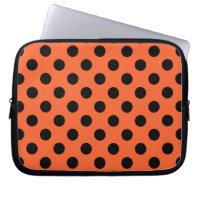 Black polka dots on orange