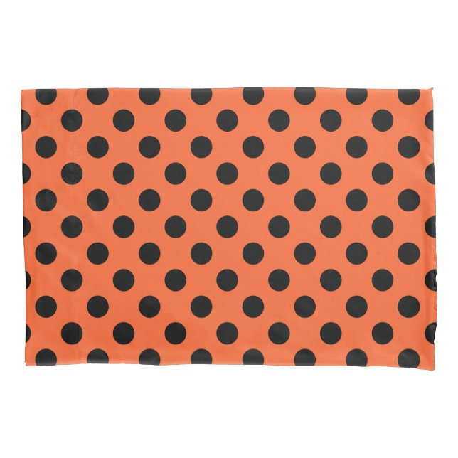 Black polka dots on orange pillowcase (Front)