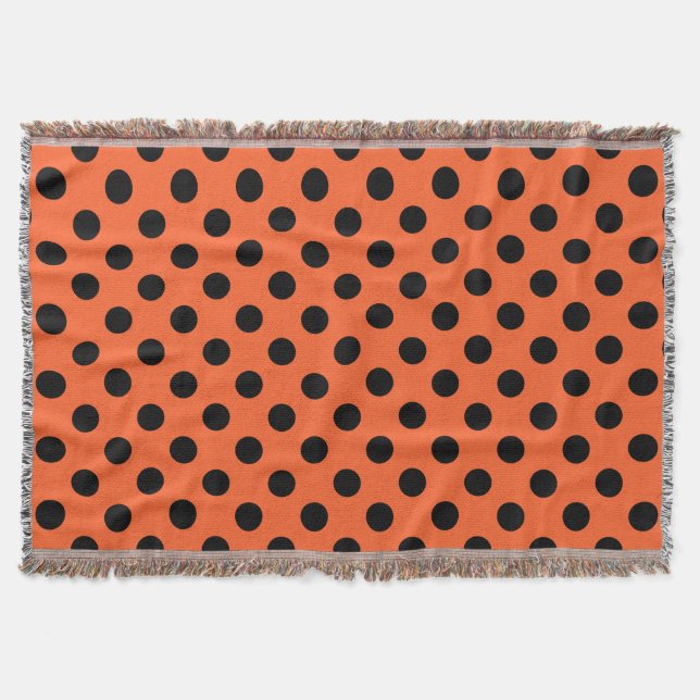Black polka dots on orange throw blanket (Front)