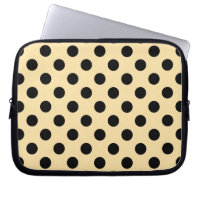 Black polka dots on pale yellow