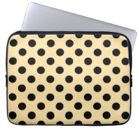 Black polka dots on pale yellow