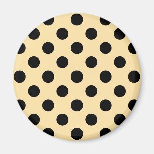 Black polka dots on pale yellow magnet