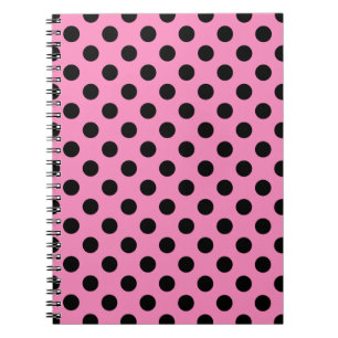 Black polka dots on pink notebook