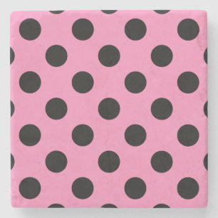 Black polka dots on pink stone coaster