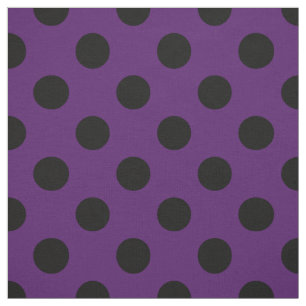 Black polka dots on plum purple fabric
