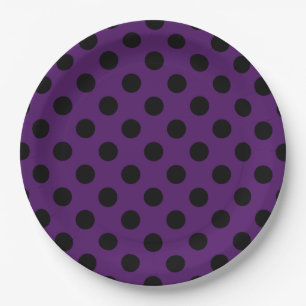 Black polka dots on plum purple paper plate