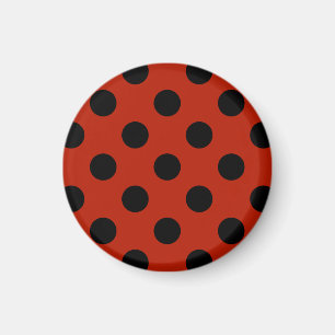 Black polka dots on red magnet