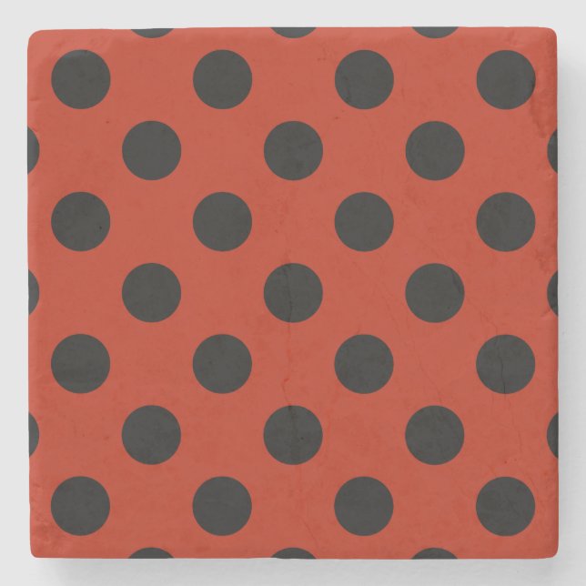 Black polka dots on red stone coaster (Front)