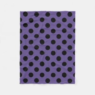 Black polka dots on ultra violet fleece blanket