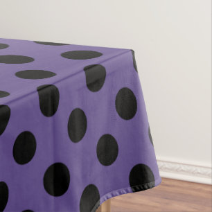 Black polka dots on ultra violet tablecloth