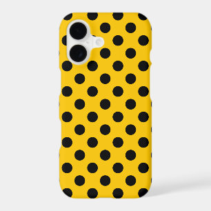 Black polka dots on yellow