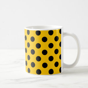Black polka dots on yellow coffee mug