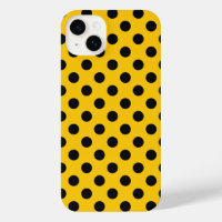 Black polka dots on yellow
