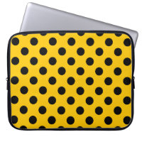 Black polka dots on yellow