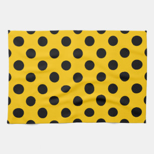 Black polka dots on yellow tea towel