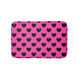 Black polka hearts on fuchsia pink bath mat