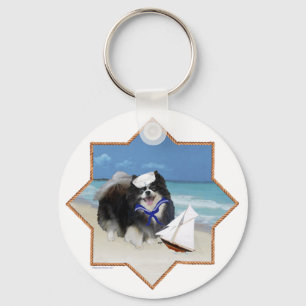 Black Pomeranian at the Beach Key Ring