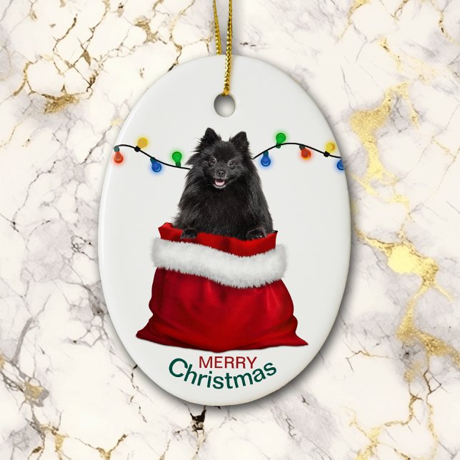 Black Pomeranian Dog in Gift Bag Christmas Ceramic Ornament (Creator Uploaded)