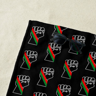 black pride red green fist pan African flag unity  Beach Towel