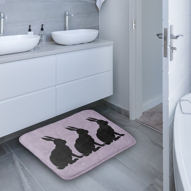 Black Rabbit Silhouette Easter Bunny Bath Mat (Three sitting rabbits in black silhouette on marbled purple bath rug.)