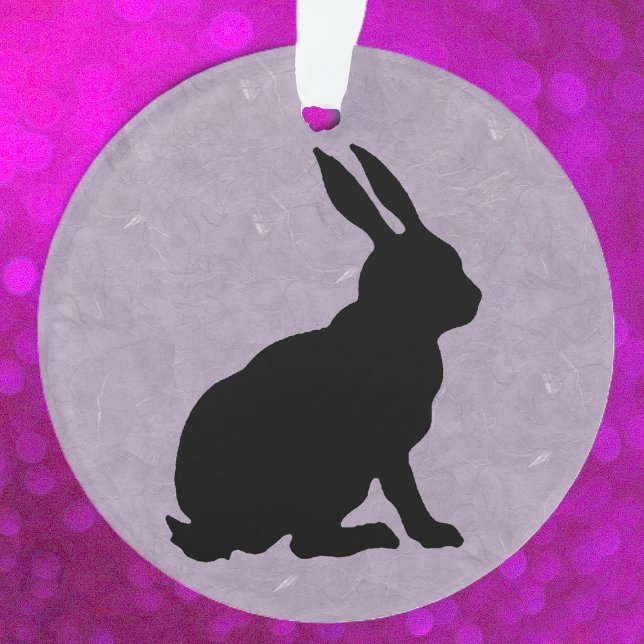 Black Rabbit Silhouette Easter Bunny Ornament (Sitting black rabbit in silhouette on pretty marbled purple on ceramic ornament.)
