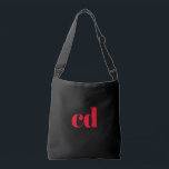 Black red monogram initials elegant modern crossbody bag<br><div class="desc">A classic chic black background. Personalise and add your monogram initials written with red block letters. Modern,  trendy and simple.</div>