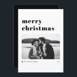 Black Retro Bold Typography Merry Christmas Photo Holiday Card<br><div class="desc">Merry Christmas! Send your holiday wishes to family and friends with this customisable modern Christmas card. It features retro bold typography with a Christmas tree accent. Personalise this photo holiday card by adding your own details. This black and white Christmas card is available in other colours.</div>