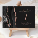 Black Rose Gold Agate Dark Wedding Table Number<br><div class="desc">The left-hand edge of this elegant modern wedding table number card features a black watercolor agate border trimmed with faux rose gold glitter. The customisable text combines rose pink handwriting,  and italic and copperplate fonts on an off-black background.</div>