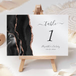 Black Rose Gold Agate Wedding Table Number<br><div class="desc">The left-hand edge of this elegant modern wedding table number card features a black watercolor agate border trimmed with faux rose gold glitter. The customisable text combines charcoal grey handwriting,  and italic and copperplate fonts on a white background.</div>
