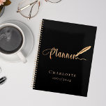 Black rose gold school work study typography 2025 planner<br><div class="desc">A chic black background,  decorated with a feather pen.  Personalise and add a name and year.  Golden text: Planner</div>