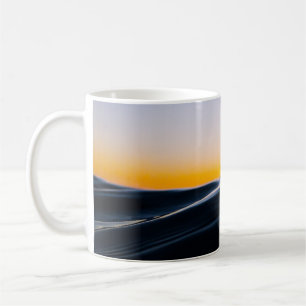 BLACK SAND UNDER ORANGE SKY DURING SUNSET COFFEE MUG