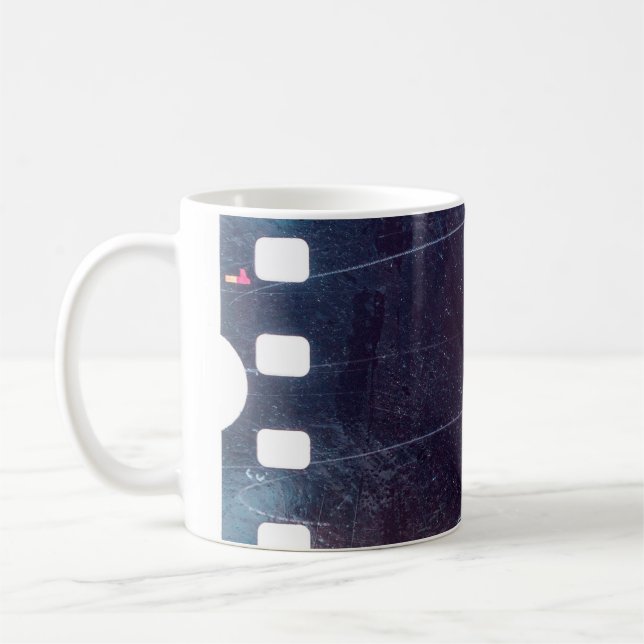 black scratched 35mm film frame, emulsion texture coffee mug (Left)