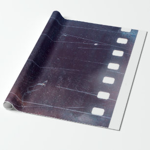 black scratched 35mm film frame, emulsion texture wrapping paper