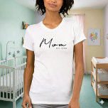 Black Script Established Mum T-Shirt<br><div class="desc">Celebrate the year she officially became a Mum with this stylish and thoughtful t-shirt. Featuring a modern, clean design, the word "MOM" is boldly displayed with "Est." followed by the customisable year. A small heart adds a sweet touch. It's the perfect gift for Mother's Day, a new mum, a pregnancy...</div>