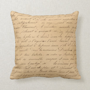 Black Script on Tan Cushion