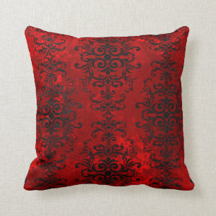 Black Scroll Designs on Shades of Red Cushion