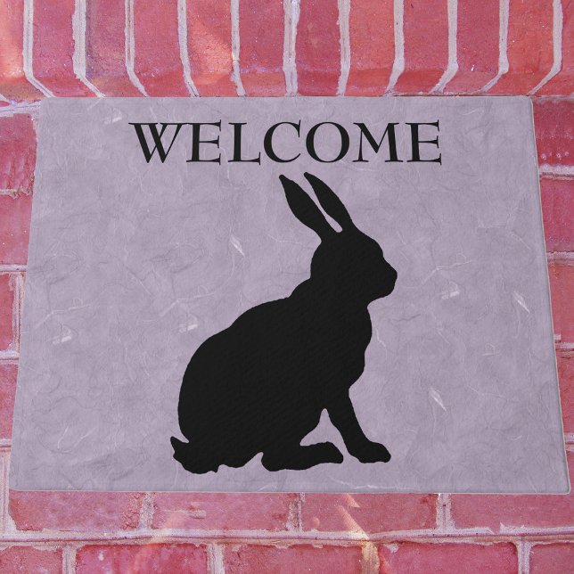 Black Sitting Rabbit Silhouette Marbled Purple Doormat (Black side profile sitting silhouette for bunny rabbit on marbled purple Welcome outdoor mat.)