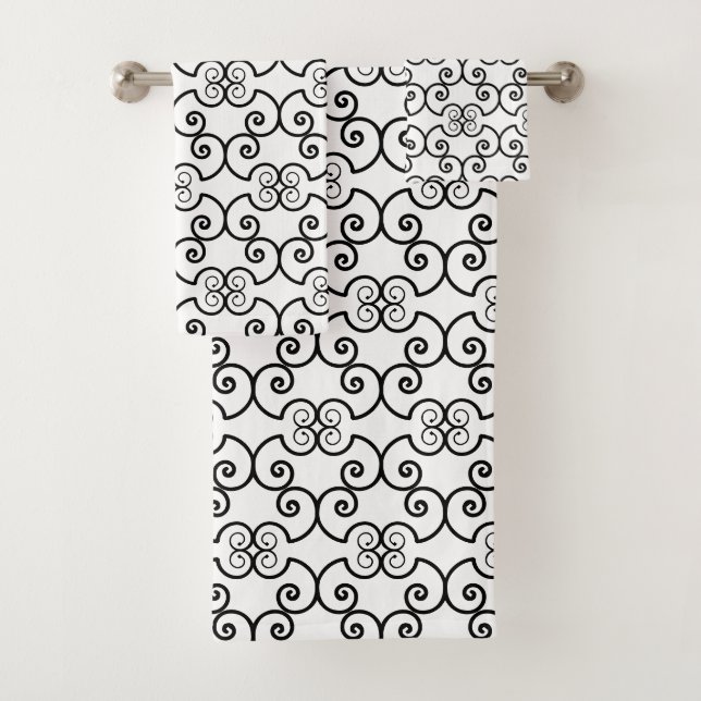 Black spiral design pattern on white bath towel set (Insitu)
