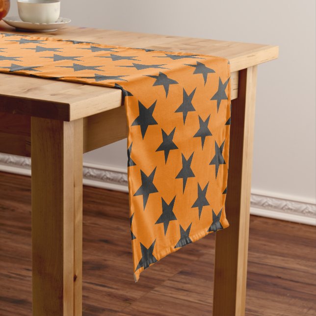 Black Stars on Pumpkin Orange Short Table Runner (In Situ)