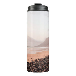 BLACK STONES ON SEASHORE THERMAL TUMBLER