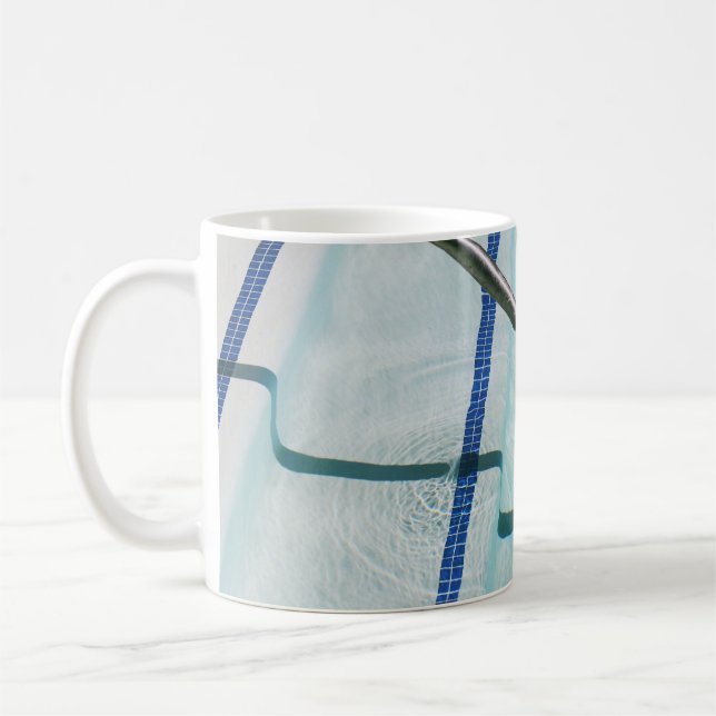 Black strap on blue swimming pool coffee mug (Left)