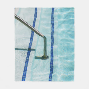 Black strap on blue swimming pool fleece blanket