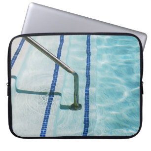 Black strap on blue swimming pool laptop sleeve