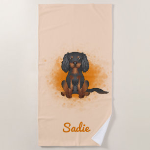 Black & Tan Cavalier King Charles Dog On Orange Beach Towel