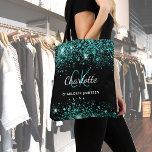 Black teal green glitter monogram tote bag<br><div class="desc">A stylish black coloured background. Decorated with teal,  green faux glitter dust. Personalise and add your first name,  monogram initials and full name. The name is written with a hand lettered style script.</div>